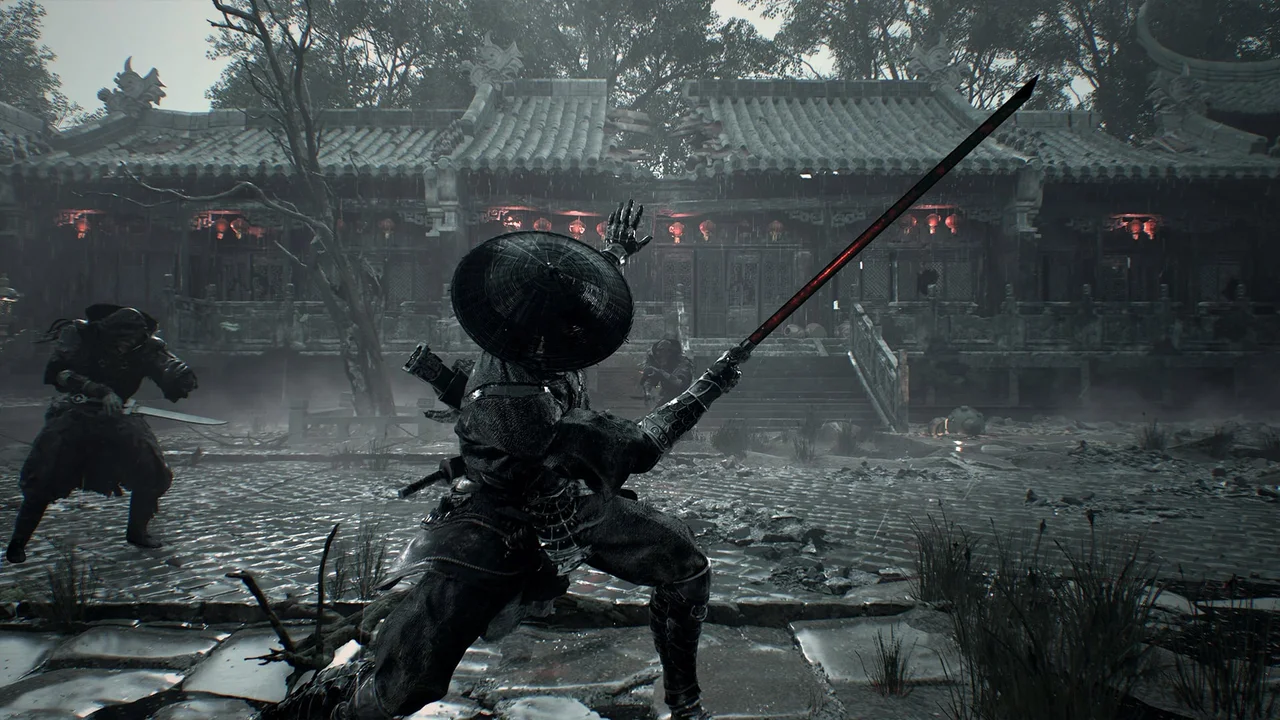 Phantom Blade Zero — A sword drawn in a ruined courtyard during combat.